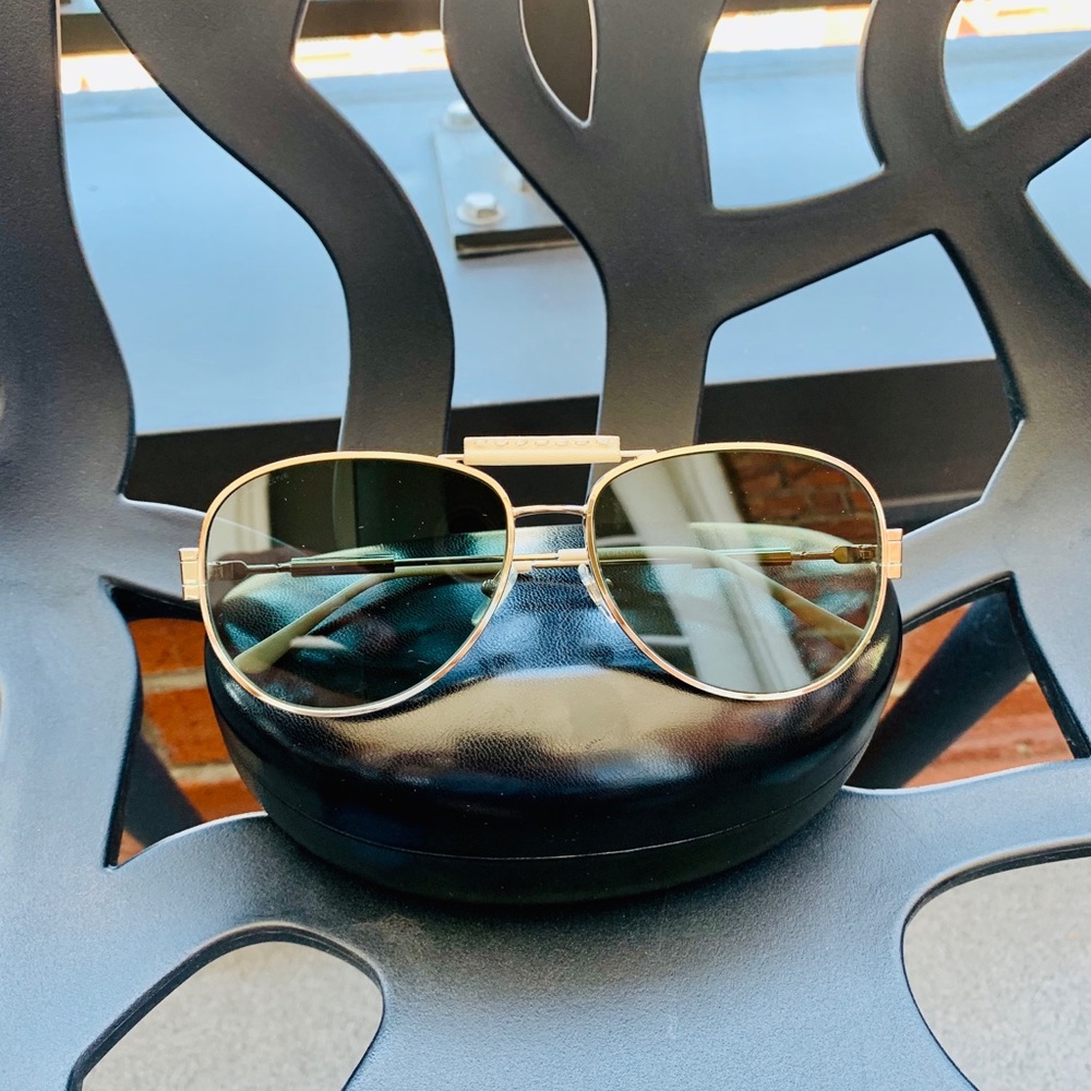 Versace Sun glasses .